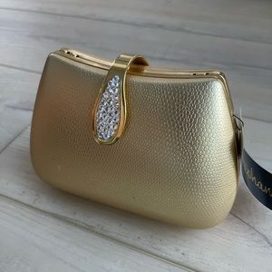 New with tag gold clutch